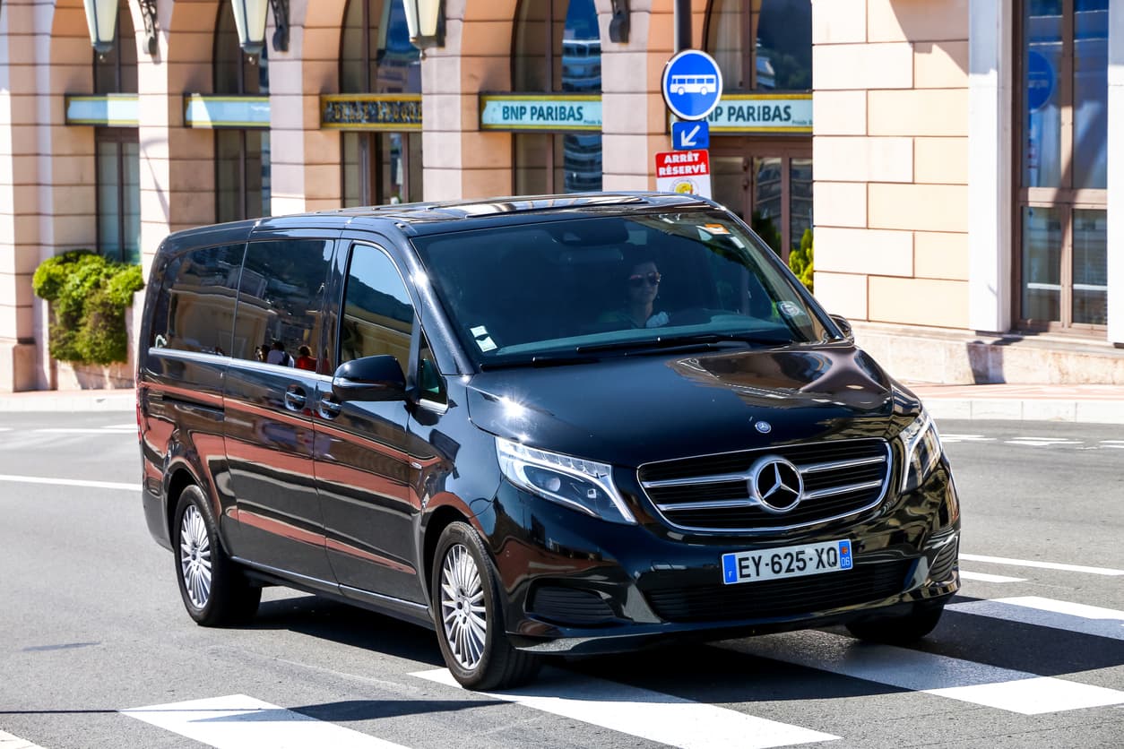 Black Luxury MPV with Chauffeur in Cannes on the road