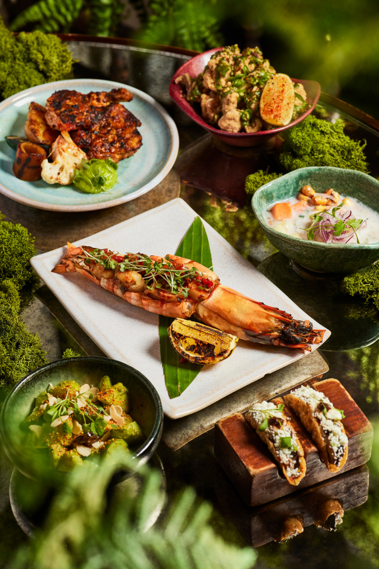 An image of beautifully presented Peruvian dishes served at the Coya restaurant in Monaco, showcasing a colorful array of flavors and textures."